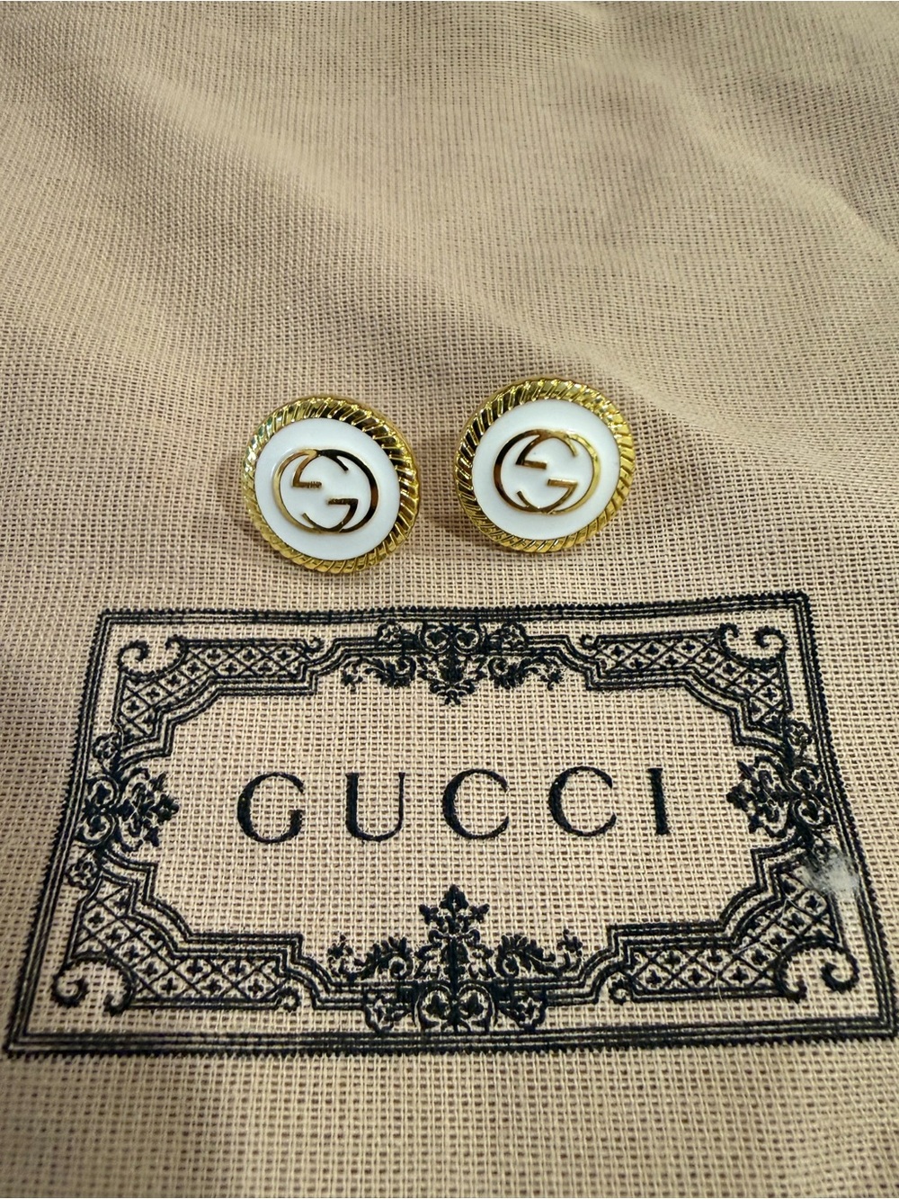 Gucci White Enamel and Gold Twisted Rim Logo Stud Earrings - Picture 2 of 2